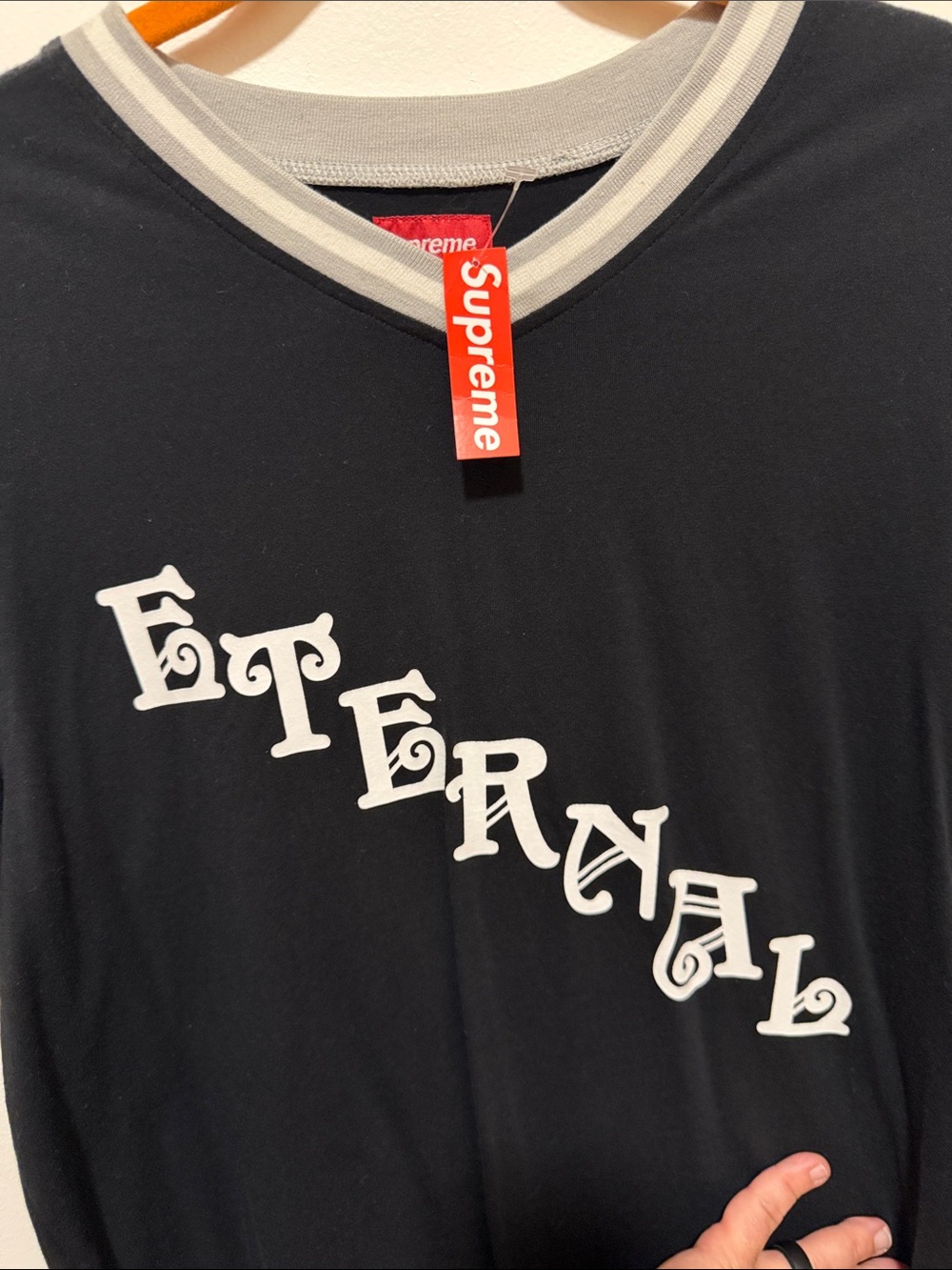 Supreme Black Tee with White 'Eternal' Diagonal Graphic